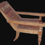 Antique teak patio chair